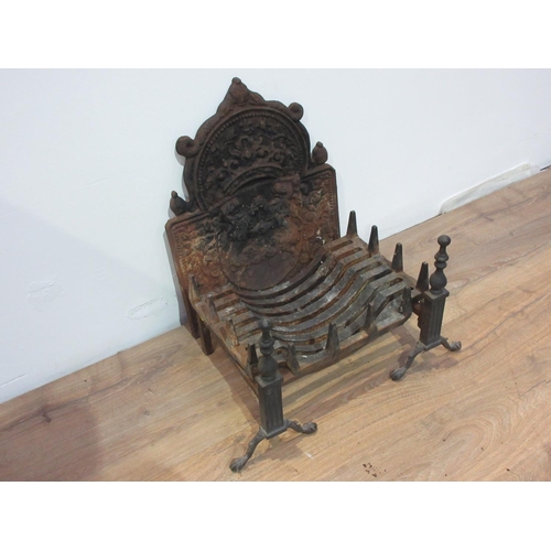 332 - A 19th Century cast iron Fire Back with embossed heraldic design of rearing lions 1ft 11 1/2in H x 1... 