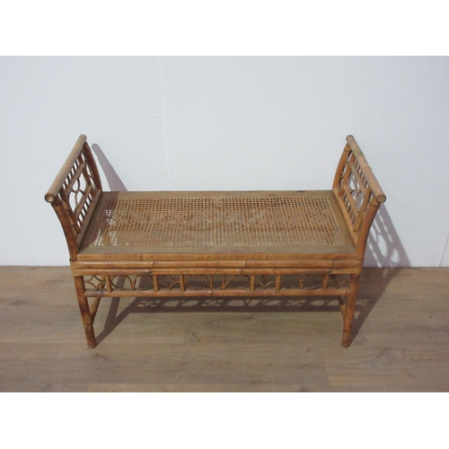 366 - An Edwardian bamboo Window Seat with cane seat (some damage) 3ft 6in W x 2ft 2in H.