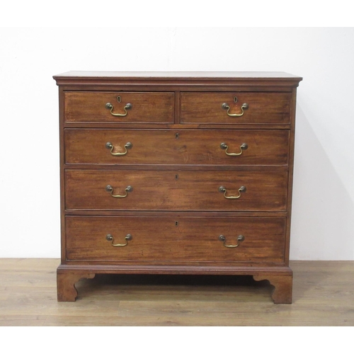 374 - A late Georgian mahogany Chest two short and three long graduated drawers with brass handles, all mo... 