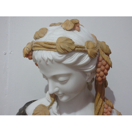 389 - A marble Bust of a classical maiden, 1ft 11in high.