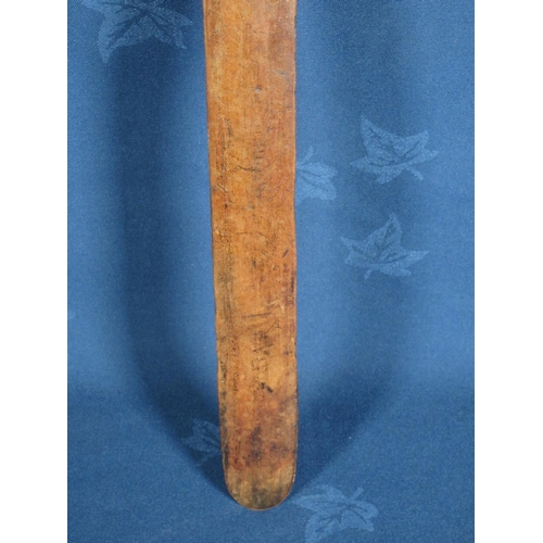 521 - An antique wooden Page Turner with carved head handle.