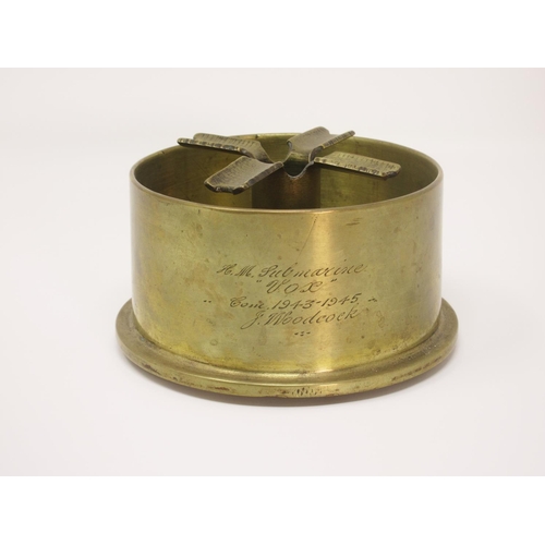 574 - A brass trench art Ashtray with compass to centre.