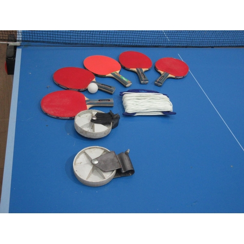 9 - An outdoor Table Tennis Table and accessories.