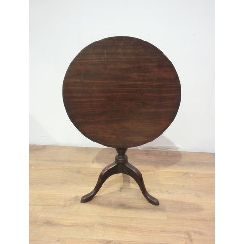 209 - A George III mahogany Pillar Table, the circular hinged top above a baluster turned column on tripod... 