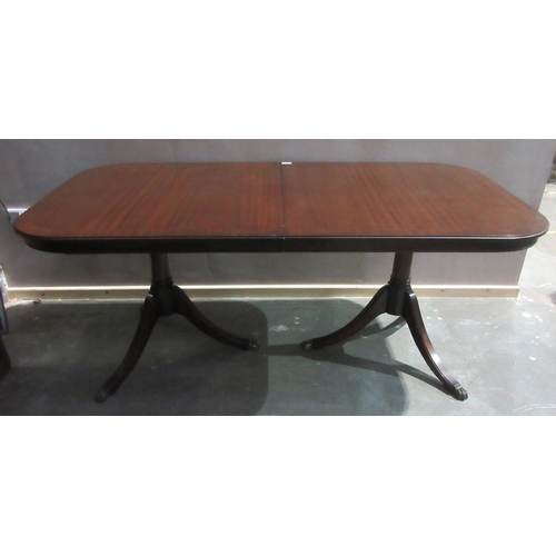 61 - A reproduction mahogany twin pedestal Dining Table with extra leaf, 6ft x 3ft 1in, 7ft 8in extended.