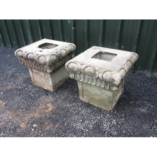 1 - A pair of composite stone Column tops 1ft 6in W x 1ft 5in H