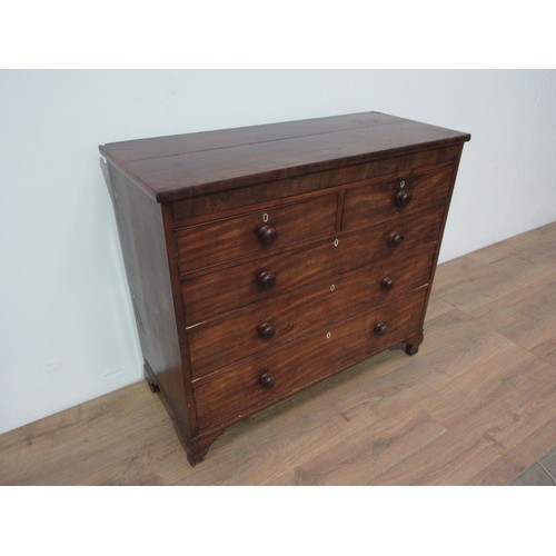 262 - A 19th Century mahogany Chest of two short and three long graduated drawers with turned knob handles... 