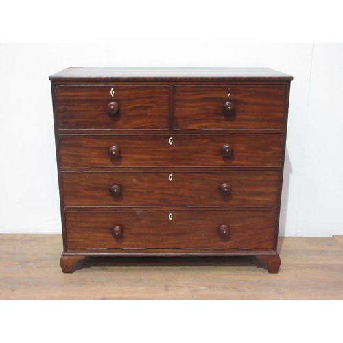 262 - A 19th Century mahogany Chest of two short and three long graduated drawers with turned knob handles... 