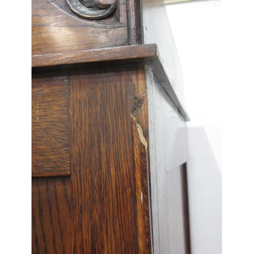 650 - An oak Wardrobe fitted single mirror door on base fitted single drawer mounted upon bracket feet 6ft... 