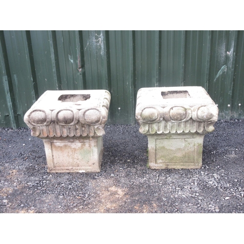 1 - A pair of composite stone Column tops 1ft 6in W x 1ft 5in H