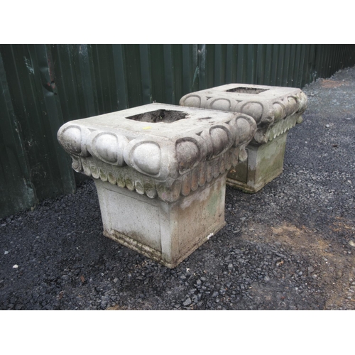 1 - A pair of composite stone Column tops 1ft 6in W x 1ft 5in H