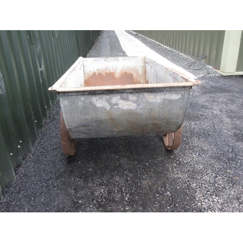 2 - A galvanised metal Barrow with cast iron spoked wheels 5ft 5in L x 2ft 5in H