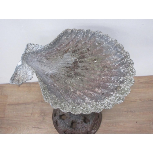 206 - A metal Bird Bath with scallop shaped top on seahorse column and circular base 2ft 2in H x 1ft 6in W