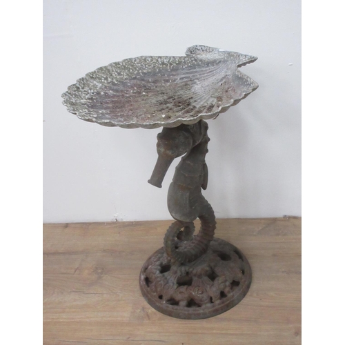 206 - A metal Bird Bath with scallop shaped top on seahorse column and circular base 2ft 2in H x 1ft 6in W