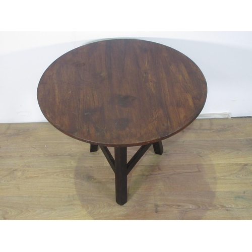 255 - A stained pine Cricket Table on square cut supports 2ft 6in D x 2ft 1in H