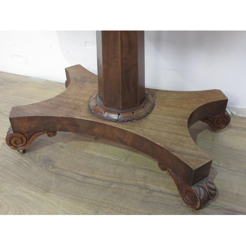 269 - A Victorian mahogany fold over Card Table mounted upon octagonal supports and four scroll feet and c... 