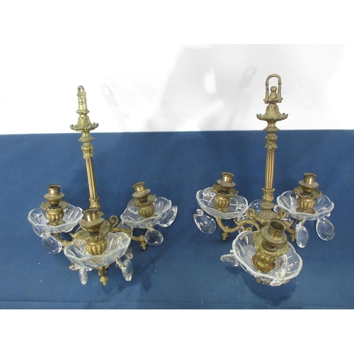 291 - A pair of French gilt brass three branch Ceiling Electroliers with cut glass drip pans and droppers ... 