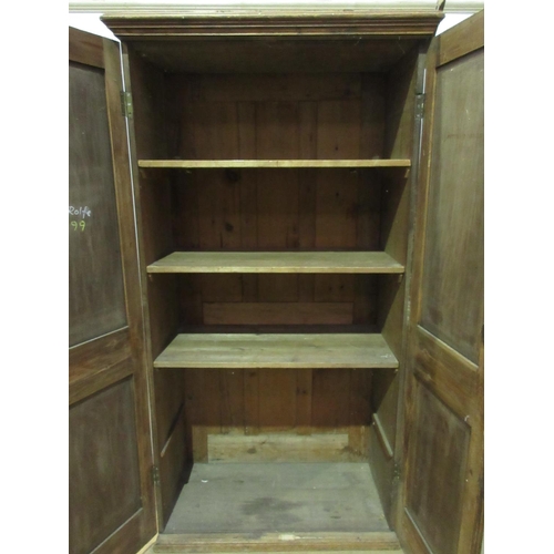 302 - A pine two door Cupboard enclosing fixed shelves 6ft 4in H x 3ft 5in W