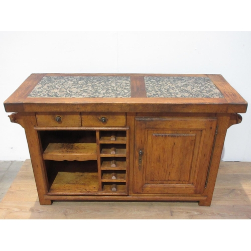 306 - An oak Kitchen Island with granite inset work surfaces fitted single drawer and a panelled cupboard ... 