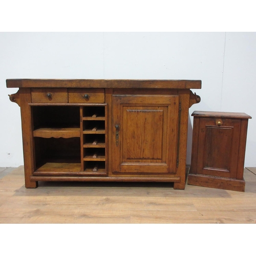 306 - An oak Kitchen Island with granite inset work surfaces fitted single drawer and a panelled cupboard ... 