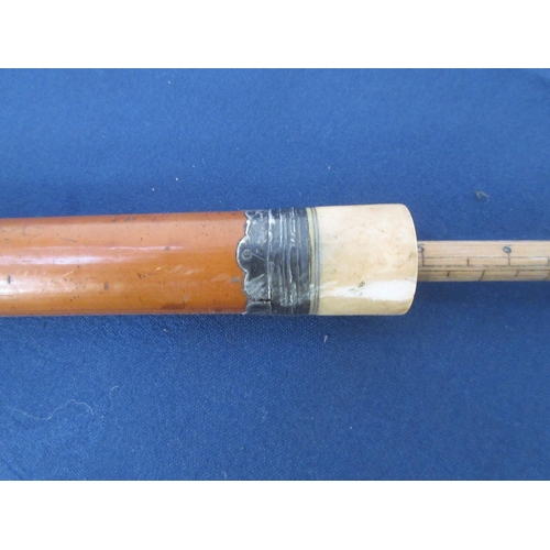 359 - A Malacca Cane and measure with ivory handle and white metal collar.