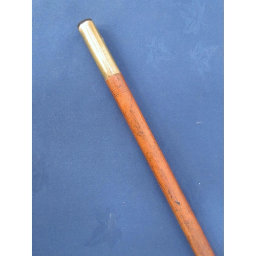 359 - A Malacca Cane and measure with ivory handle and white metal collar.