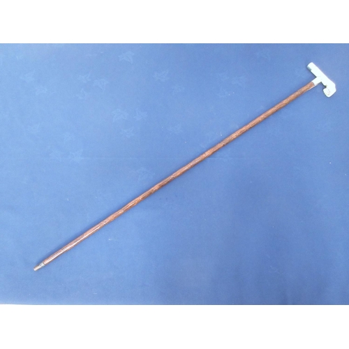 361 - A simulated bamboo Stick with carved hoof ivory handle and silver mounts.