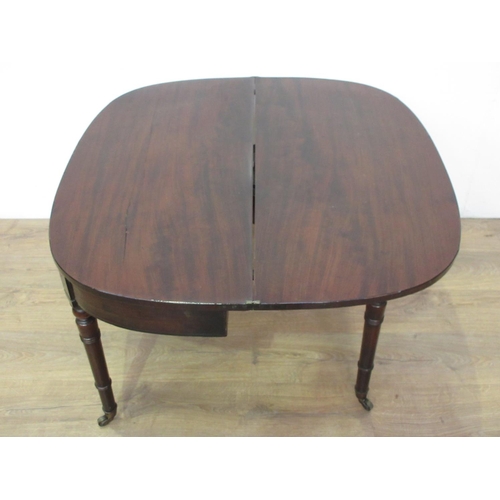 400 - A 19th Century mahogany fold-over Tea Table on ring turned supports and casters, 3ft 3in W