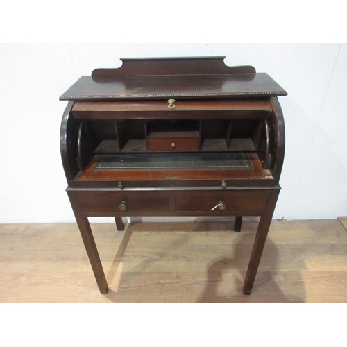 414 - A mahogany cylinder Desk with fitted interior, pull-out writing surface, fitted two drawers, 2ft 9in... 