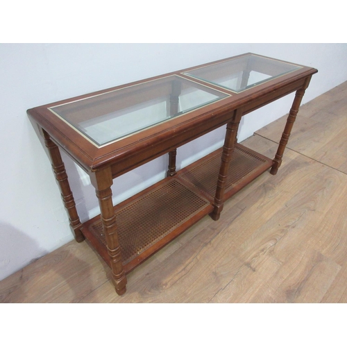 427 - A reproduction Side Table with glass panels and cane panels to the base, 4 ft 3 in W x 2 ft 3 in H x... 