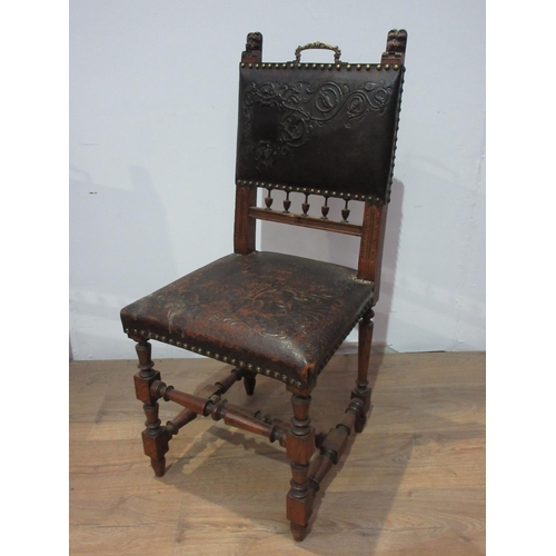 438 - A set of four Victorian oak Hall Chairs with tooled leather backs and stuffover seats, the uprights ... 