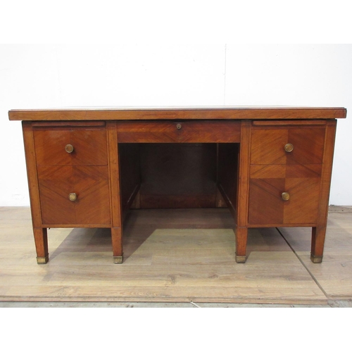 472 - A reproduction kingwood veneered French Desk each pedestal fitted two brass handled drawers and moun... 