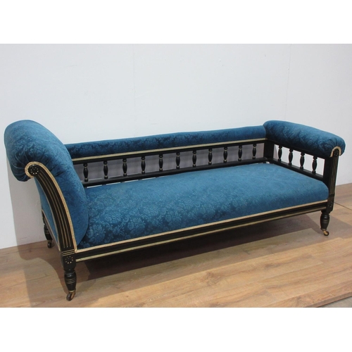 478 - A 19th Century Empire style black and gilt painted double ended Chaise Lounge with turned spindle ba... 