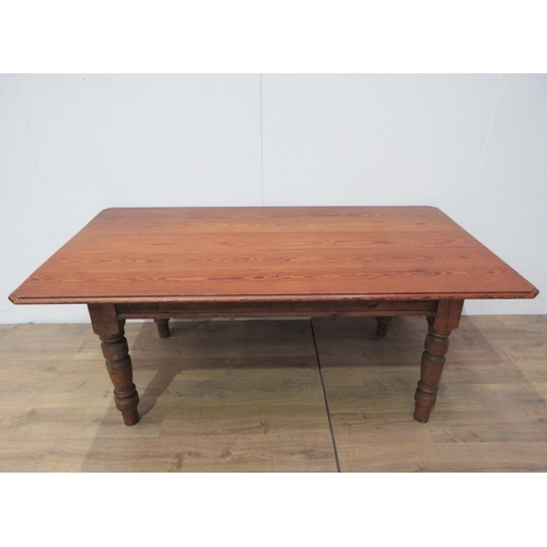 482 - A Victorian pitch pine topped Farmhouse Table with chamfered corners mounted upon turned supports 6f... 