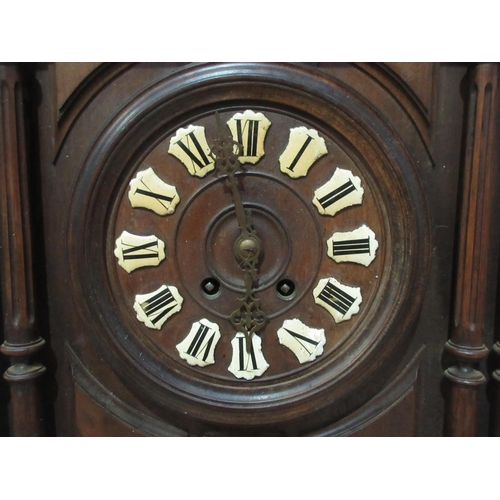 489 - A Victorian walnut Wall Clock with broken arch and urn pediment 3ft L x 1ft 5in W (lacking glass to ... 