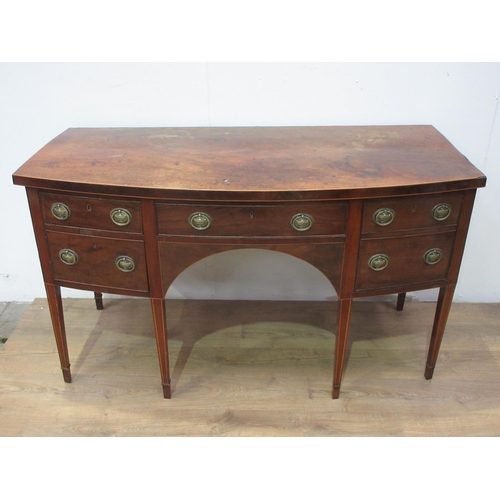 498 - A Regency mahogany bow fronted Sideboard with boxwood stringing fitted two shallow drawers, one deep... 