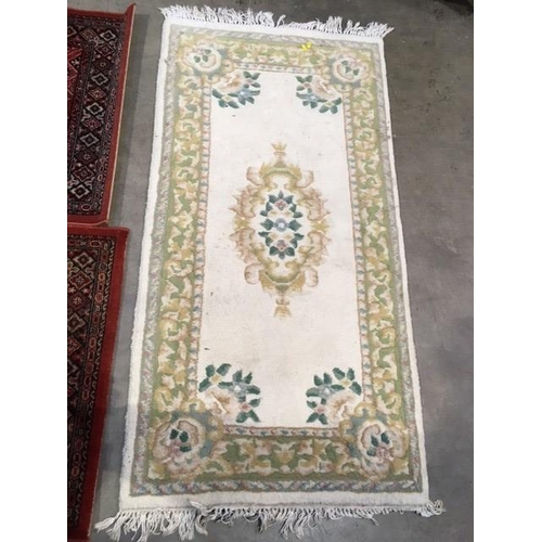 5 - Two modern red ground Runners 8ft 2in L x 2ft 7in W and a Chinese cream Rug 5ft L x 2ft 6in W