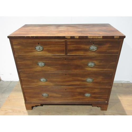 527 - A 19th Century mahogany Chest of two short and three long drawers with brass handles mounted on ogee... 