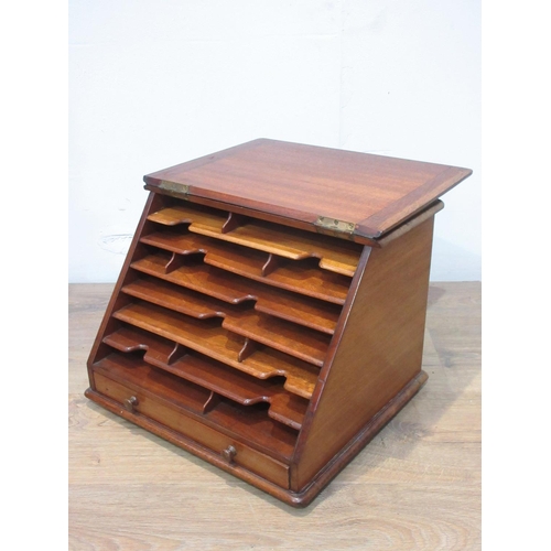 528 - A Victorian mahogany Stationary Cabinet, the sloping front enclosing sheves above a drawer 1ft 3in W... 