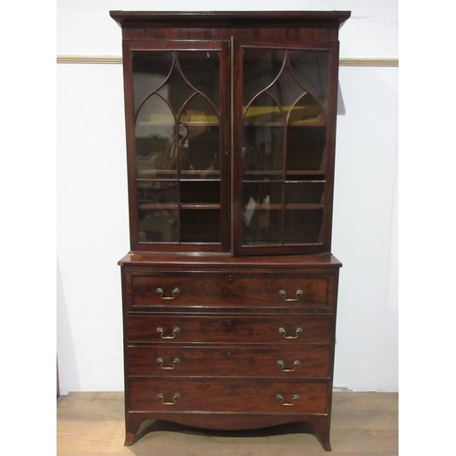 549 - A 19th Century mahogany Secretaire Bookcase, the upper section fitted pairof gothic arched glazed do... 