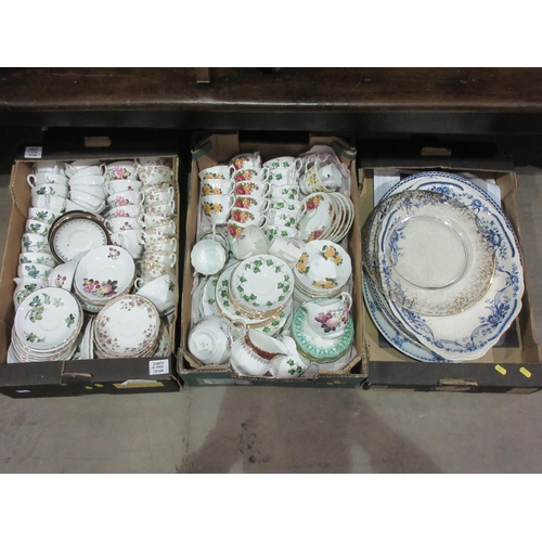 557 - Three boxes of part Tea Services and blue and white Platters