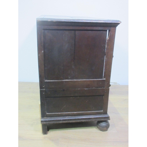 565 - A 18th Century moulded oak Chest of three long drawers mounted on bun feet 2ft 11in W x 2ft 9in H