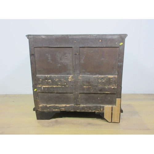 565 - A 18th Century moulded oak Chest of three long drawers mounted on bun feet 2ft 11in W x 2ft 9in H