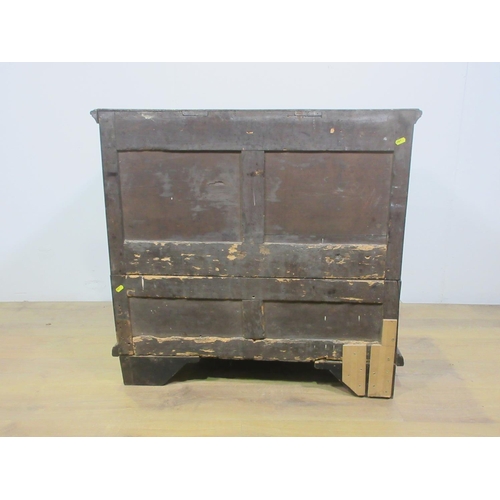 565 - A 18th Century moulded oak Chest of three long drawers mounted on bun feet 2ft 11in W x 2ft 9in H