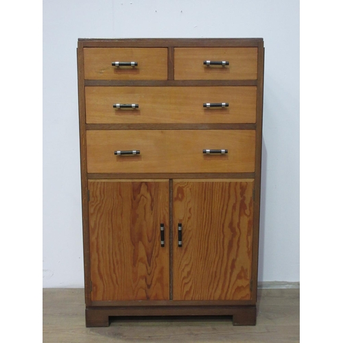 574 - An Art Deco style oak Bedroom Chest of drawers and cupboards, 4 ft 1 in H x 2 ft 5 in W x 17 in D.