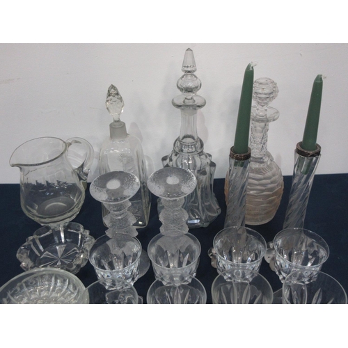 58 - A box of glassware including three Decanters, pair of silver rimmed Candlesticks, another pair of Ca... 