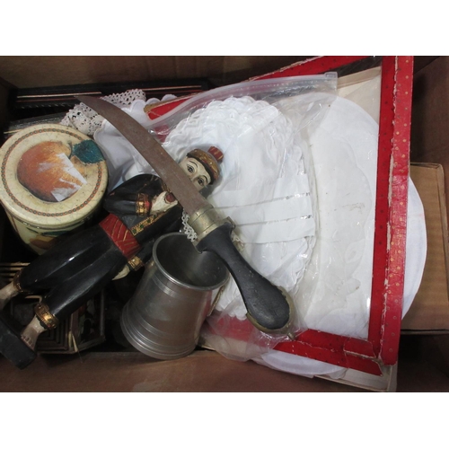 581 - Three boxes containing figures, kitchenware, table lamps (passed PAT test), etc.