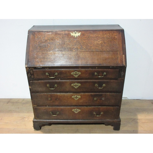 582 - An antique oak Bureau fitted four long drawers, 3 ft 2 in W A/F.