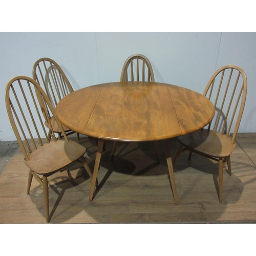 583 - A pale elm Ercol Dining Table and four Chairs, 4 ft open x 3 ft 7 in.