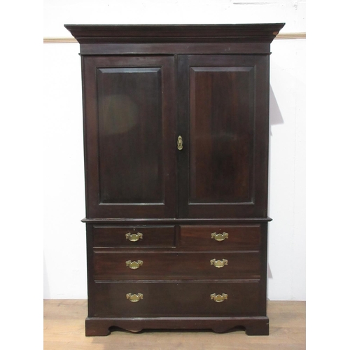 584 - A mahogany Linen Press, the base fitted two short and two long drawers (no slides in the upper secti... 